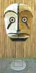 Product image 1 of the product “Large Mask on Stand - Modell 2, 220cm height, original color, metal art Mask and stand are seperated. ”